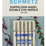Aguja Schmetz doble ojo